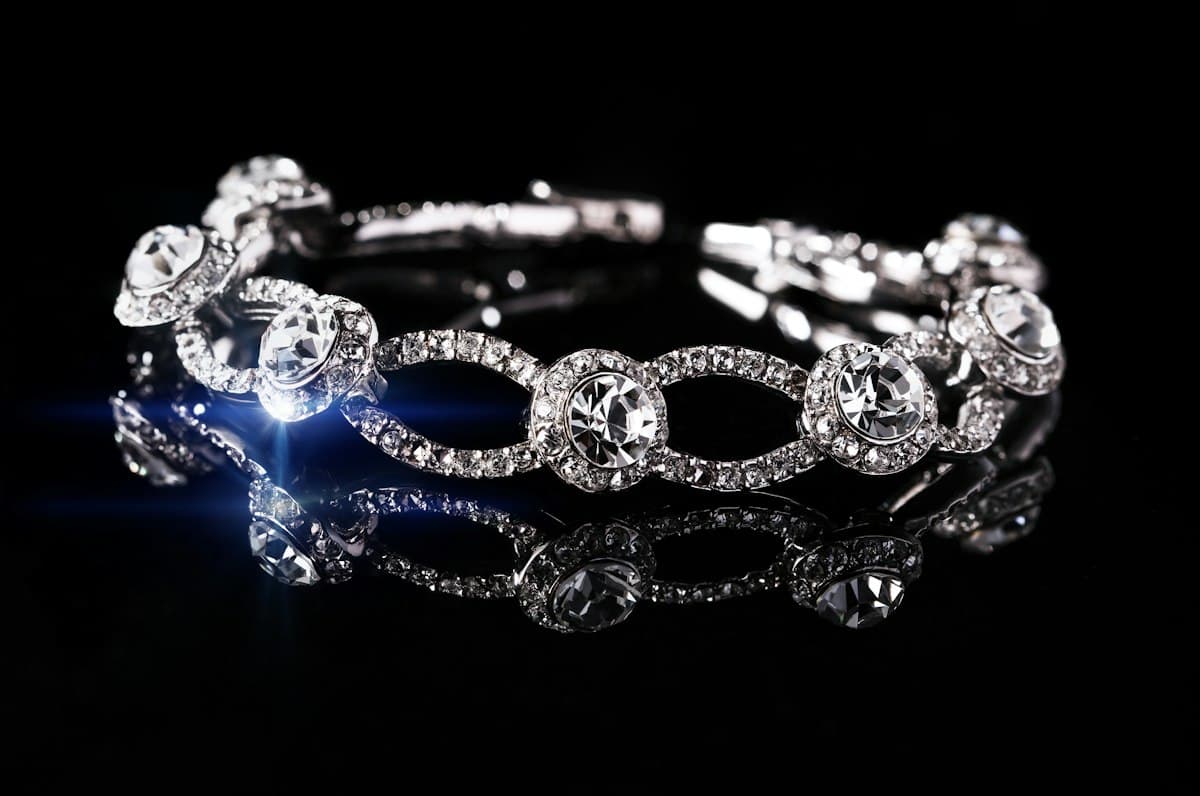 Diamond link bracelet sparkling on a black surface